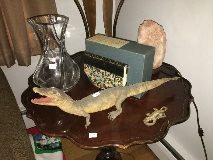 Baccarat vase, crocodile, books, salt lamp