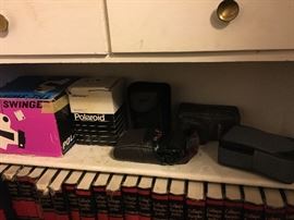 Vintage cameras + Bushnell binoculars