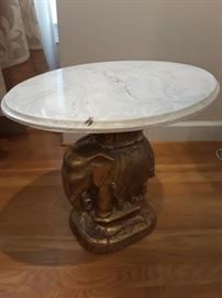 Metal elephant with faux marble top