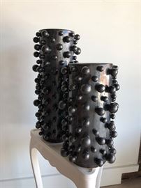 Graphite Molecule Vase by Global Views Spheres of varying sizes are playfully bound to these cylindrical ceramic vases Dimensions 8ʺW × 8ʺD × 19ʺH