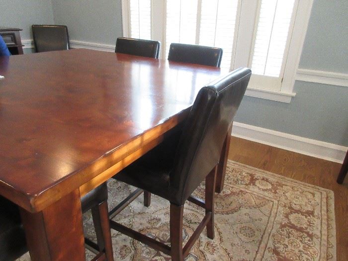 Large bar height dining table with 8 chairs