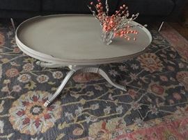 antiqued coffee table on 8 by 10 wool rug