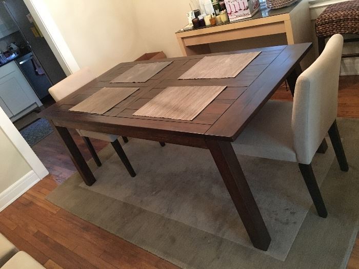 West Elm table , made in Indonesia and floor rug, as is.