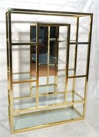 Lot 134 MILO BAUGHMAN Style Gilt Aluminum Etagere Display
