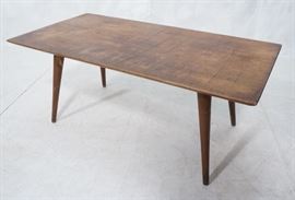 Lot 190 Small Modern Wood Coffee Table. Tapered peg legs.