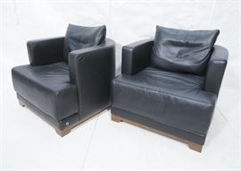 Lot 376 Pr Black NATUZZI Leather Barrel Back Lounge Chair