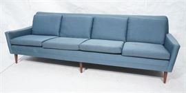 Lot 610 DUX Modern Blue Sofa Couch. Tapered peg legs. Unm