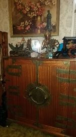 Room full of Oriental items-furniture, décor, prints