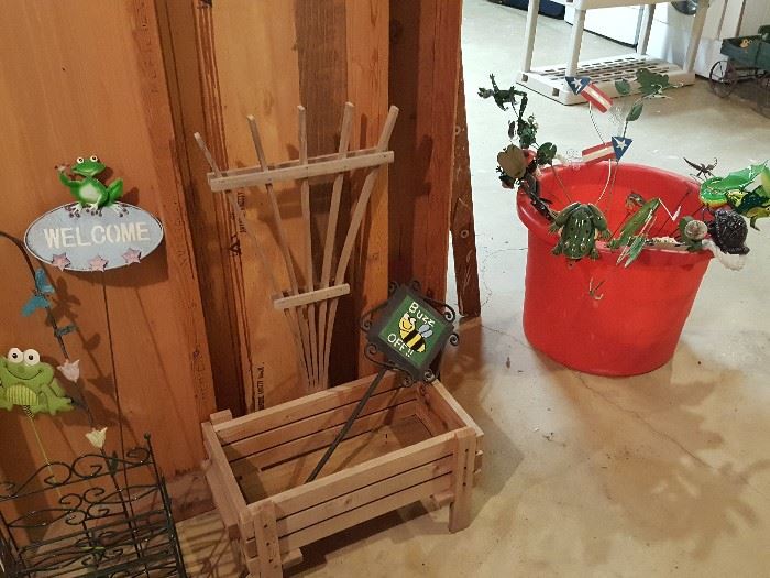 Lots of yard/planter stakes with decorations