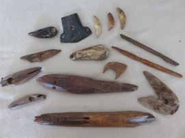 Inuit carved bone, stone and ivory artifacts.