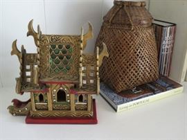 Thai "spirit" house and New Guinea woven fish basket.