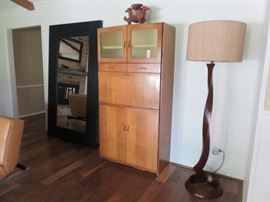 Pair of impressive Restoration Hardware wall mirrors, Art Deco style quarter-sawn oak Hoosier cabinet and modernist carved wood floor lamp.