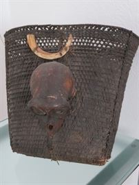 East Indian Naga shaman's basket mounted with tusk and monkey skull.