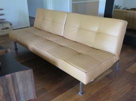 Innovations leather/chrome reclining sofa, as is reparable condition.