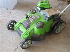 GreenWorks lithium battery-powered 20" lawnmower, in like-new condition with grass catcher.