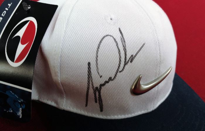 Signed by "Tiger Wood" , proceeds to benefit Make a Wish Foundation