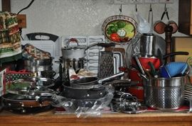 Stainless steel cookware, cast iron, baking pans, roasters, skillets, sets of dishes, molds, cutting boards