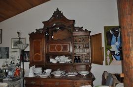 Viennese exquisite antique Baroque walnut sideboard with original marble top 8’ 8’ tall, white china some ironstone, Italian white platters, assorted barware and goblets, art