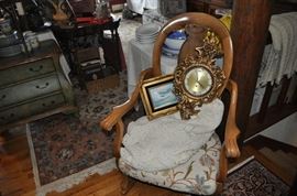 Beautiful antique rocking chair with tapestry upholstery seat, old painting, Syroco clock, hand crocheted tablecloth  (or throw)