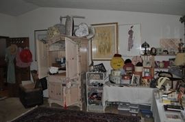 The amazing armoire -- PACKED with all sorts of pretty sheets and shams and pillowcases... a table FULL of really cool hatboxes and several are old.   Zoom in to see even more treasures!  Oh -- there's a really pretty chair on top of the armoire with a couple more hat boxes.  