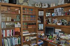 This is the library just outside of that enormous master bedroom.  FULL of books and office supplies, cups and saucers, folders, magazine holders, photo boxes, printers, scissors, greeting cards, some fine porcelain, lots of old cigar boxes, an office chair... a vintage typewriter, paper, a monitor, oodles of pens and pencils, staplers, tape dispensers, more books, envelopes, an awesome fish decanter, a Wild Turkey decanter, and... there is really a LOT more!