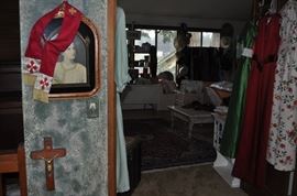 I love this religious print!  It's beautifully framed... clergy sash, and a sick call crucifix.