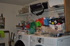 Sorry... the washer and dryer aren't for sale -- but look at the vases and all those cleaning supplies!  This laundry room is huge and it's packed with goodies.