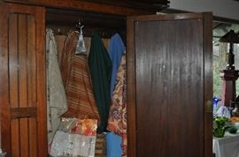 Although we say we will NEVER use our client's furniture for displaying things for sale... well, we fibbed.  We totally ran out of room  This beautiful armoire in the living room (single drawer AND with drawers) is full of tablecloths and napkins...