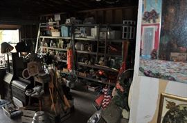 And now the garage... the garage EVERY guy wants to own... nearly 800sf and pretty close to two stories tall!   5ft stainless junction box, air tools, animated 5ft santa, Aquaflow pump, building supplies, camping supplies, Christmas and holiday items, cleaning supplies, commercial painting equipment and supplies, contractor’s equipment, Craftsman tool boxes, extensions cords, fishing collectibles antique and vintage, fishing equipment new and old, fishing rods and reels, garden art TONS, garden fertilizers and more, gardening supplies and tools hundreds, Imperial 6 burner stove/oven, ladders, Livingston 2 person fiberglass boat, loading ramps, Lorex cookware fan, Minnkota trolling motor, outdoor pots, paint sprayers, pet supplies, picnic table, plants, plastic bins all sizes, plumbing supplies, refrigerator, secretary with glass doors above drop front with drawers, front with drawers, Zero gravity outdoor chair… and the regular stuff – saws, hammers, wrenches, plumbing stuff, screwdriv