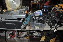 And now the garage... the garage EVERY guy wants to own... nearly 800sf and pretty close to two stories tall!   5ft stainless junction box, air tools, animated 5ft santa, Aquaflow pump, building supplies, camping supplies, Christmas and holiday items, cleaning supplies, commercial painting equipment and supplies, contractor’s equipment, Craftsman tool boxes, extensions cords, fishing collectibles antique and vintage, fishing equipment new and old, fishing rods and reels, garden art TONS, garden fertilizers and more, gardening supplies and tools hundreds, Imperial 6 burner stove/oven, ladders, Livingston 2 person fiberglass boat, loading ramps, Lorex cookware fan, Minnkota trolling motor, outdoor pots, paint sprayers, pet supplies, picnic table, plants, plastic bins all sizes, plumbing supplies, refrigerator, secretary with glass doors above drop front with drawers, front with drawers, Zero gravity outdoor chair… and the regular stuff – saws, hammers, wrenches, plumbing stuff, screwdriv