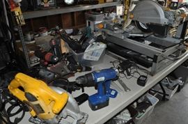 And now the garage... the garage EVERY guy wants to own... nearly 800sf and pretty close to two stories tall!   5ft stainless junction box, air tools, animated 5ft santa, Aquaflow pump, building supplies, camping supplies, Christmas and holiday items, cleaning supplies, commercial painting equipment and supplies, contractor’s equipment, Craftsman tool boxes, extensions cords, fishing collectibles antique and vintage, fishing equipment new and old, fishing rods and reels, garden art TONS, garden fertilizers and more, gardening supplies and tools hundreds, Imperial 6 burner stove/oven, ladders, Livingston 2 person fiberglass boat, loading ramps, Lorex cookware fan, Minnkota trolling motor, outdoor pots, paint sprayers, pet supplies, picnic table, plants, plastic bins all sizes, plumbing supplies, refrigerator, secretary with glass doors above drop front with drawers, front with drawers, Zero gravity outdoor chair… and the regular stuff – saws, hammers, wrenches, plumbing stuff, screwdriv