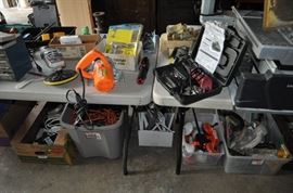 And now the garage... the garage EVERY guy wants to own... nearly 800sf and pretty close to two stories tall!   5ft stainless junction box, air tools, animated 5ft santa, Aquaflow pump, building supplies, camping supplies, Christmas and holiday items, cleaning supplies, commercial painting equipment and supplies, contractor’s equipment, Craftsman tool boxes, extensions cords, fishing collectibles antique and vintage, fishing equipment new and old, fishing rods and reels, garden art TONS, garden fertilizers and more, gardening supplies and tools hundreds, Imperial 6 burner stove/oven, ladders, Livingston 2 person fiberglass boat, loading ramps, Lorex cookware fan, Minnkota trolling motor, outdoor pots, paint sprayers, pet supplies, picnic table, plants, plastic bins all sizes, plumbing supplies, refrigerator, secretary with glass doors above drop front with drawers, front with drawers, Zero gravity outdoor chair… and the regular stuff – saws, hammers, wrenches, plumbing stuff, screwdriv