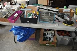 And now the garage... the garage EVERY guy wants to own... nearly 800sf and pretty close to two stories tall!   5ft stainless junction box, air tools, animated 5ft santa, Aquaflow pump, building supplies, camping supplies, Christmas and holiday items, cleaning supplies, commercial painting equipment and supplies, contractor’s equipment, Craftsman tool boxes, extensions cords, fishing collectibles antique and vintage, fishing equipment new and old, fishing rods and reels, garden art TONS, garden fertilizers and more, gardening supplies and tools hundreds, Imperial 6 burner stove/oven, ladders, Livingston 2 person fiberglass boat, loading ramps, Lorex cookware fan, Minnkota trolling motor, outdoor pots, paint sprayers, pet supplies, picnic table, plants, plastic bins all sizes, plumbing supplies, refrigerator, secretary with glass doors above drop front with drawers, front with drawers, Zero gravity outdoor chair… and the regular stuff – saws, hammers, wrenches, plumbing stuff, screwdriv