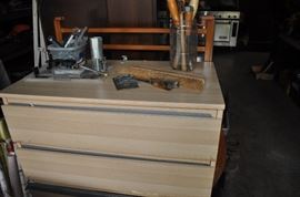 And now the garage... the garage EVERY guy wants to own... nearly 800sf and pretty close to two stories tall!   5ft stainless junction box, air tools, animated 5ft santa, Aquaflow pump, building supplies, camping supplies, Christmas and holiday items, cleaning supplies, commercial painting equipment and supplies, contractor’s equipment, Craftsman tool boxes, extensions cords, fishing collectibles antique and vintage, fishing equipment new and old, fishing rods and reels, garden art TONS, garden fertilizers and more, gardening supplies and tools hundreds, Imperial 6 burner stove/oven, ladders, Livingston 2 person fiberglass boat, loading ramps, Lorex cookware fan, Minnkota trolling motor, outdoor pots, paint sprayers, pet supplies, picnic table, plants, plastic bins all sizes, plumbing supplies, refrigerator, secretary with glass doors above drop front with drawers, front with drawers, Zero gravity outdoor chair… and the regular stuff – saws, hammers, wrenches, plumbing stuff, screwdriv