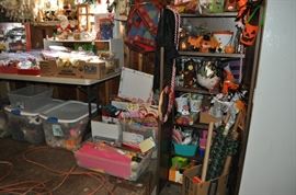 And now the garage... the garage EVERY guy wants to own... nearly 800sf and pretty close to two stories tall!   5ft stainless junction box, air tools, animated 5ft santa, Aquaflow pump, building supplies, camping supplies, Christmas and holiday items, cleaning supplies, commercial painting equipment and supplies, contractor’s equipment, Craftsman tool boxes, extensions cords, fishing collectibles antique and vintage, fishing equipment new and old, fishing rods and reels, garden art TONS, garden fertilizers and more, gardening supplies and tools hundreds, Imperial 6 burner stove/oven, ladders, Livingston 2 person fiberglass boat, loading ramps, Lorex cookware fan, Minnkota trolling motor, outdoor pots, paint sprayers, pet supplies, picnic table, plants, plastic bins all sizes, plumbing supplies, refrigerator, secretary with glass doors above drop front with drawers, front with drawers, Zero gravity outdoor chair… and the regular stuff – saws, hammers, wrenches, plumbing stuff, screwdriv