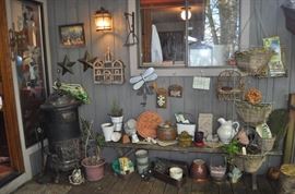 Garden art... tons of gardening tools, pots, patio set, hammock on stand, sooo many birdhouses, statuary, plant stands, old ladders, rusty treasures, bird bath, garden tool stand, hoses, Columbia winery wood bench, garden fertilizers and more, gardening books, gardening supplies and tools hundreds,  wooden table, wooden bench, garden hand tools, wind chimes, wire baskets, hose reel, planters, compost bins, wicker, wrought iron pot hangers, patio chairs, little red wagon, picket fencing, corrugated metal, garden carts, shepherds’ hooks, bags of gravel, rakes/shovels/hoes/spades/clippers/cultivators, tool caddy, slab of granite, ladders, garden wall art, strawberry pot, weather vane, terra cotta, vintage duck decoy wind chime, cast concrete leaves, wrought iron small tables, gardening hand tools, bird feeders, garden signs, boots, garden whimsey…