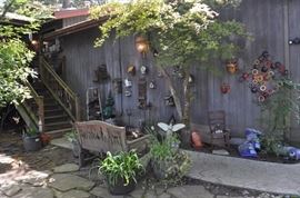 Garden art... tons of gardening tools, pots, patio set, hammock on stand, sooo many birdhouses, statuary, plant stands, old ladders, rusty treasures, bird bath, garden tool stand, hoses, Columbia winery wood bench, garden fertilizers and more, gardening books, gardening supplies and tools hundreds,  wooden table, wooden bench, garden hand tools, wind chimes, wire baskets, hose reel, planters, compost bins, wicker, wrought iron pot hangers, patio chairs, little red wagon, picket fencing, corrugated metal, garden carts, shepherds’ hooks, bags of gravel, rakes/shovels/hoes/spades/clippers/cultivators, tool caddy, slab of granite, ladders, garden wall art, strawberry pot, weather vane, terra cotta, vintage duck decoy wind chime, cast concrete leaves, wrought iron small tables, gardening hand tools, bird feeders, garden signs, boots, garden whimsey…