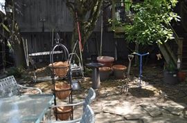 Garden art... tons of gardening tools, pots, patio set, hammock on stand, sooo many birdhouses, statuary, plant stands, old ladders, rusty treasures, bird bath, garden tool stand, hoses, Columbia winery wood bench, garden fertilizers and more, gardening books, gardening supplies and tools hundreds,  wooden table, wooden bench, garden hand tools, wind chimes, wire baskets, hose reel, planters, compost bins, wicker, wrought iron pot hangers, patio chairs, little red wagon, picket fencing, corrugated metal, garden carts, shepherds’ hooks, bags of gravel, rakes/shovels/hoes/spades/clippers/cultivators, tool caddy, slab of granite, ladders, garden wall art, strawberry pot, weather vane, terra cotta, vintage duck decoy wind chime, cast concrete leaves, wrought iron small tables, gardening hand tools, bird feeders, garden signs, boots, garden whimsey…