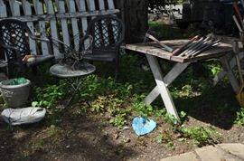 Garden art... tons of gardening tools, pots, patio set, hammock on stand, sooo many birdhouses, statuary, plant stands, old ladders, rusty treasures, bird bath, garden tool stand, hoses, Columbia winery wood bench, garden fertilizers and more, gardening books, gardening supplies and tools hundreds,  wooden table, wooden bench, garden hand tools, wind chimes, wire baskets, hose reel, planters, compost bins, wicker, wrought iron pot hangers, patio chairs, little red wagon, picket fencing, corrugated metal, garden carts, shepherds’ hooks, bags of gravel, rakes/shovels/hoes/spades/clippers/cultivators, tool caddy, slab of granite, ladders, garden wall art, strawberry pot, weather vane, terra cotta, vintage duck decoy wind chime, cast concrete leaves, wrought iron small tables, gardening hand tools, bird feeders, garden signs, boots, garden whimsey…