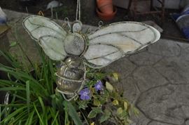 Garden art... tons of gardening tools, pots, patio set, hammock on stand, sooo many birdhouses, statuary, plant stands, old ladders, rusty treasures, bird bath, garden tool stand, hoses, Columbia winery wood bench, garden fertilizers and more, gardening books, gardening supplies and tools hundreds,  wooden table, wooden bench, garden hand tools, wind chimes, wire baskets, hose reel, planters, compost bins, wicker, wrought iron pot hangers, patio chairs, little red wagon, picket fencing, corrugated metal, garden carts, shepherds’ hooks, bags of gravel, rakes/shovels/hoes/spades/clippers/cultivators, tool caddy, slab of granite, ladders, garden wall art, strawberry pot, weather vane, terra cotta, vintage duck decoy wind chime, cast concrete leaves, wrought iron small tables, gardening hand tools, bird feeders, garden signs, boots, garden whimsey…