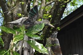 Garden art... tons of gardening tools, pots, patio set, hammock on stand, sooo many birdhouses, statuary, plant stands, old ladders, rusty treasures, bird bath, garden tool stand, hoses, Columbia winery wood bench, garden fertilizers and more, gardening books, gardening supplies and tools hundreds,  wooden table, wooden bench, garden hand tools, wind chimes, wire baskets, hose reel, planters, compost bins, wicker, wrought iron pot hangers, patio chairs, little red wagon, picket fencing, corrugated metal, garden carts, shepherds’ hooks, bags of gravel, rakes/shovels/hoes/spades/clippers/cultivators, tool caddy, slab of granite, ladders, garden wall art, strawberry pot, weather vane, terra cotta, vintage duck decoy wind chime, cast concrete leaves, wrought iron small tables, gardening hand tools, bird feeders, garden signs, boots, garden whimsey…