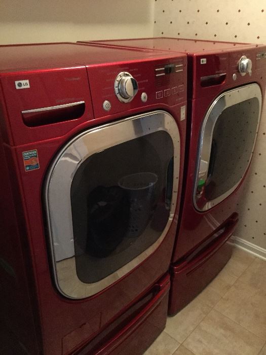 Lg Front Loading Washer and Dryer with Cabinets Below