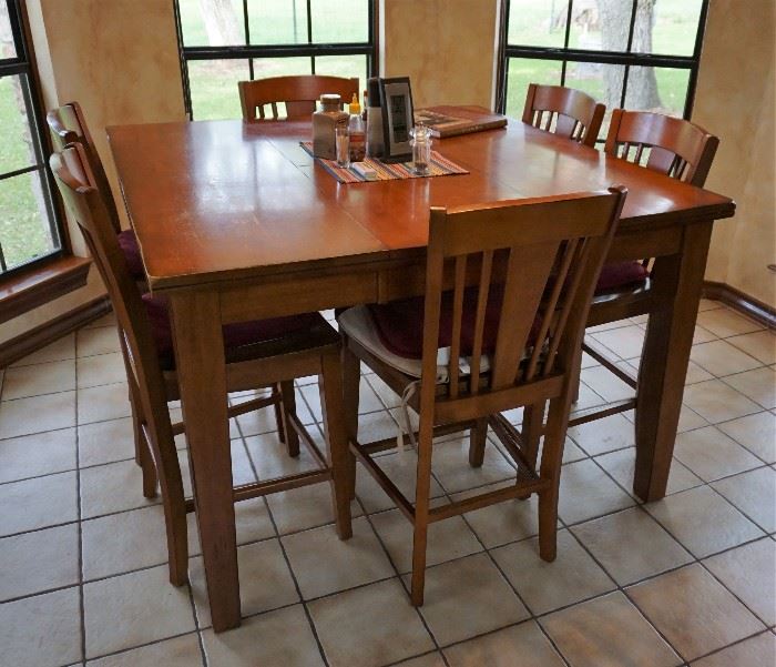 Bar height dining table and 8 chairs