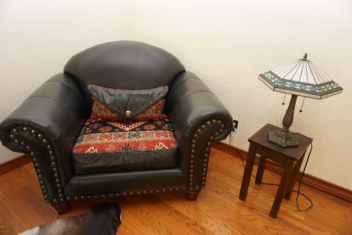 Leather chair and pair of Tiffany style lamps