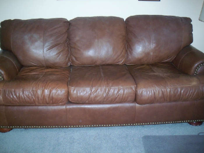 Brown leather sofa sleeper