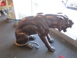 This bronze tiger is 26" tall and 3' long
