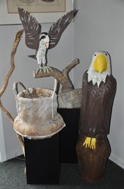 Carved wooden Hawk on tree stand (33"h x 16"w) with large carved wooden painted Eagle on Stump (45"h x 10"w)  and large bark woven basket 