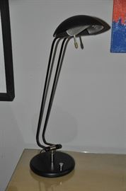 One of the many pairs of contemporary adjustable table lamps available made in Italy