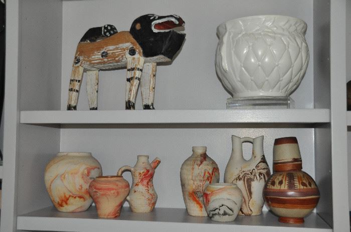More of the "Indian" pottery collection shown with painted wooden folk art dog and another quilted McCoy planter