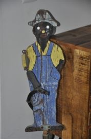 Folk Art carved and painted wooden Gardener on cast iron stand